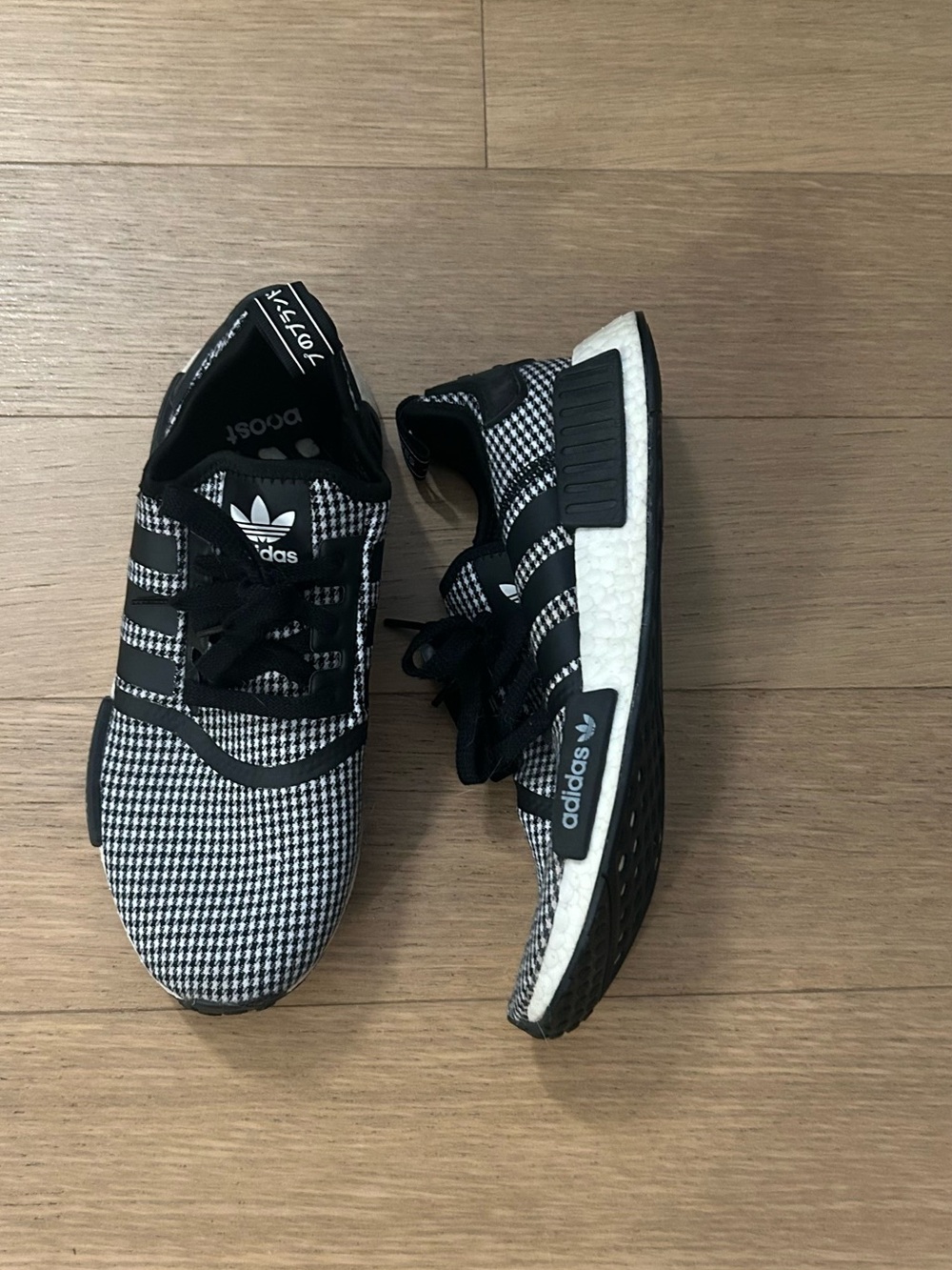 Woman’s Adidas Houndstooth NMD R1 Sneakers